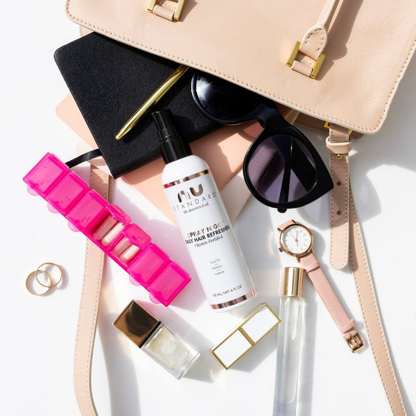 HAIR WELLNESS ON-THE-GO products we love falling from a purse